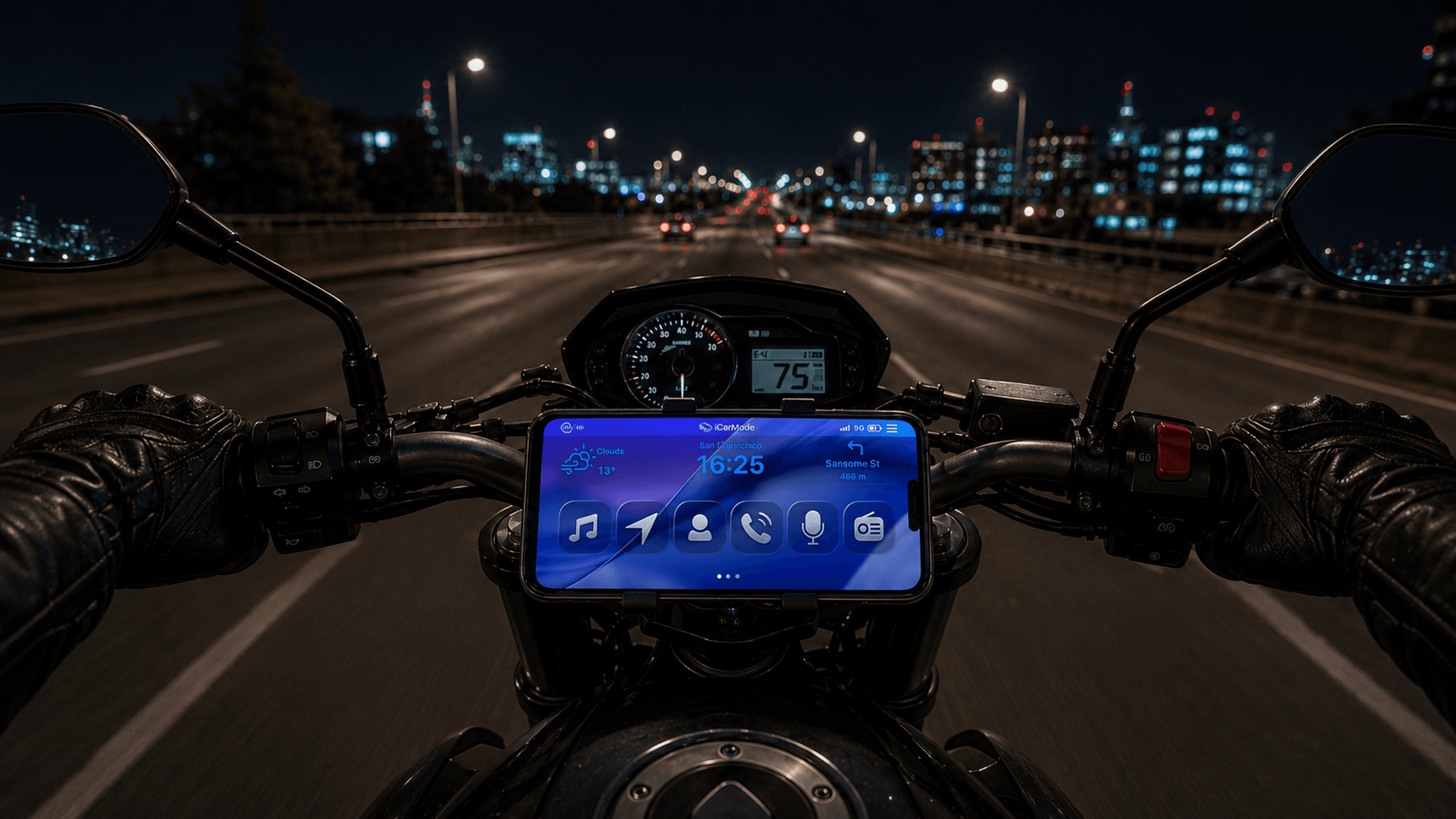 iCarMode mounted on a motorcycle during a night ride